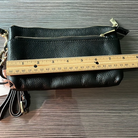 Small black leather crossbody with optional wristlet strap. - Picture 8 of 10